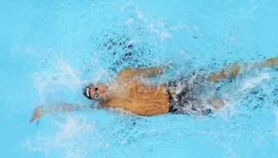 Swimming-Italy's Ceccon wins men's 100 metres backstroke gold