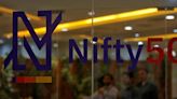 Indian shares open lower on IT pullback, Ambuja Cements jumps on acquisition