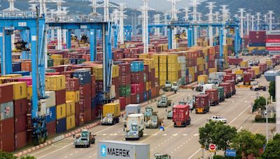 China's exports rise solidly, but slower imports temper outlook