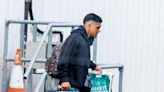 Celtic star Luis Palma spotted carrying a suitcase with his own face on it