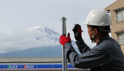 Japanese town blocks iconic Mount Fuji view to stop bad behaviour by tourists