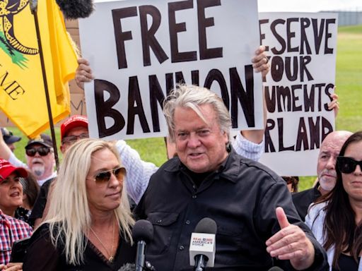 Marjorie Taylor Greene stumps for Steve Bannon as he reports to prison