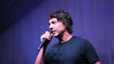 Comedian Arj Barker asks breastfeeding mother to leave show after baby talked during his set
