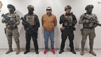 Capturan a expolicía federal acusado de contrabando de droga en el AICM