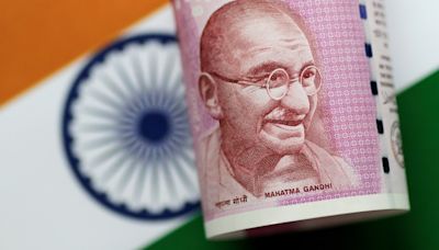 Rupee declines as early election trends spur dollar buying