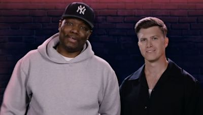 Colin Jost and Michael Che are hosting "some kind of live comedy thing" for Peacock