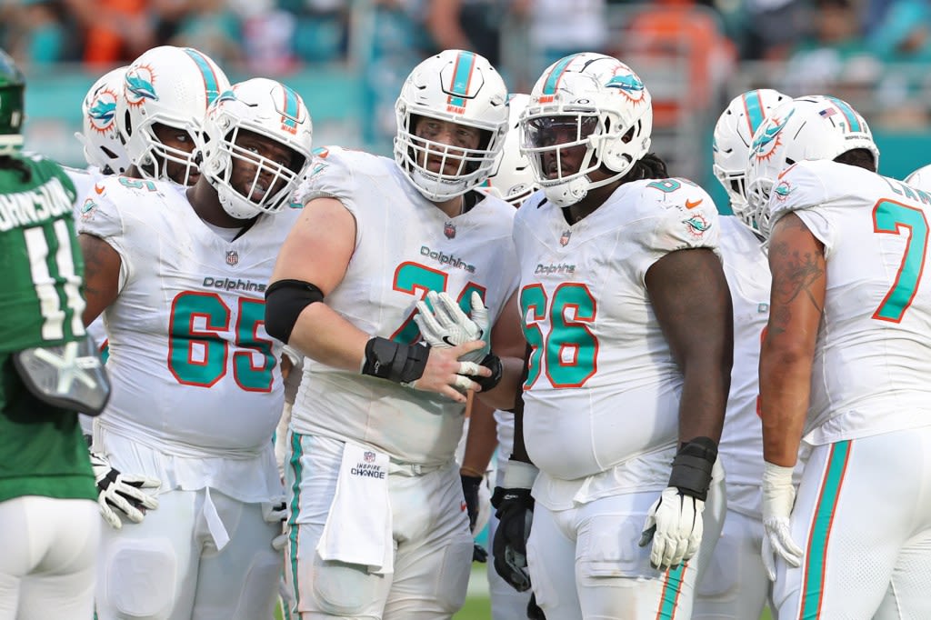 What are the key position battles to watch for on the Dolphins? | Countdown to camp