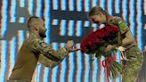 Ukrainian soldier proposes to his sweetheart after joining Ukraine's Armed Forces to free her from Russian occupation – video