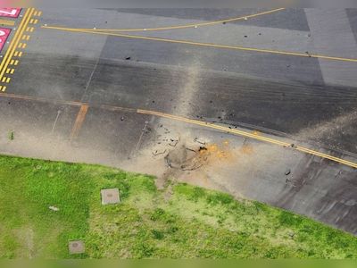 Suspected US bomb from World War II explodes at airport in Japan, causes massive crater on taxiway - CNBC TV18