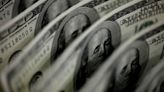 Dollar slides, CPI data suggests Fed could slow pace of rate hikes