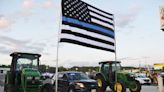 Operation Blue Sky: procession of police drives through local communities