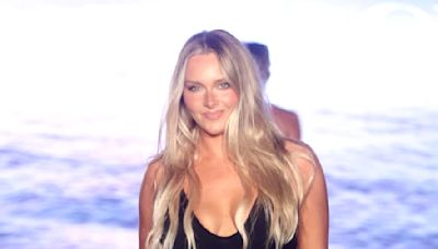 Camille Kostek Rocks Miami Swim Week Runway in Chic Black One-Piece