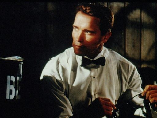 30 Years Ago, Arnold Schwarzenegger Made The Riskiest Spy Movie of the '90s