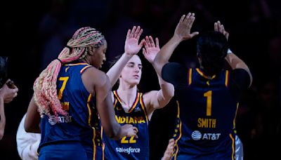 Raucous crowd roars its approval for Caitlin Clark in her home debut with Fever, an 83-80 win