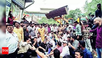 Bombay High Court directs civic and police chiefs to stop mob rule and demolish illegal building in Dombivli East | Mumbai News - Times of India