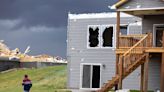 Tornadoes collapse buildings and level homes in Nebraska and Iowa