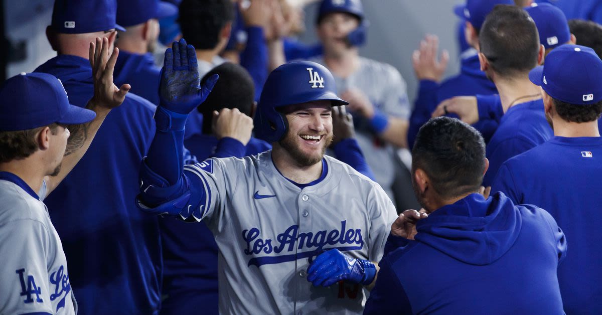 Dodgers score a dozen runs to win their fifth straight game