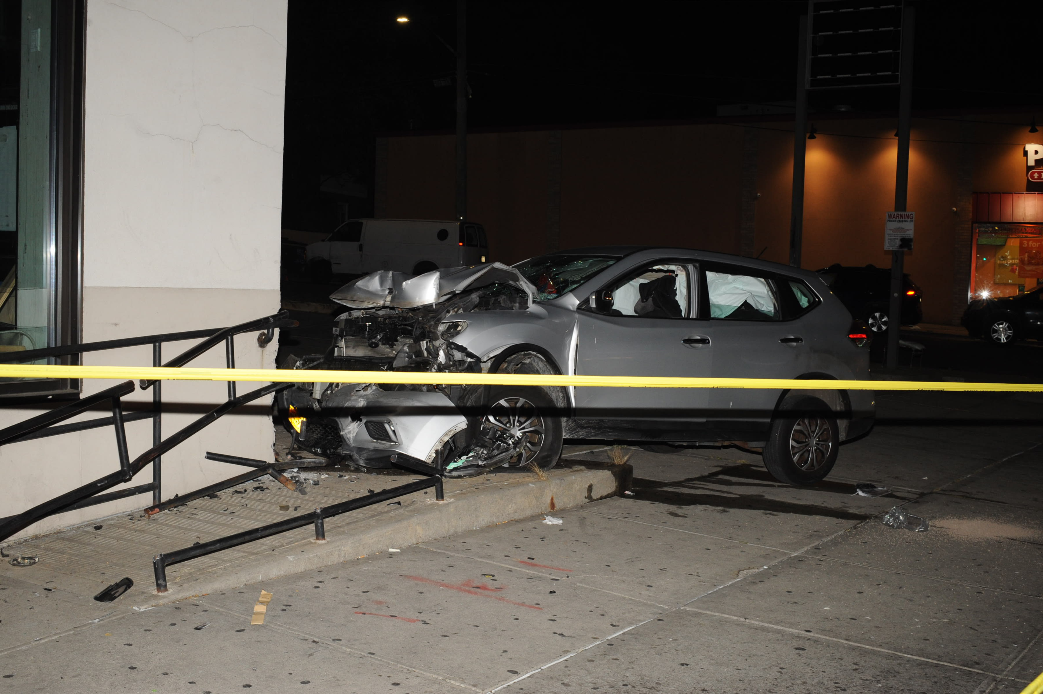 Driver in Queens shot in head, crashes into woman on sidewalk