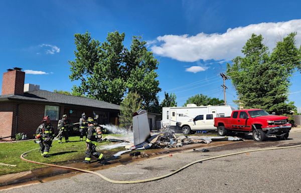4 hospitalized after small plane crashes in suburban Denver yard after trying to land on street
