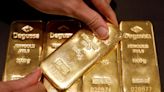 China's central bank to return to gold buying as prices ease, analysts say