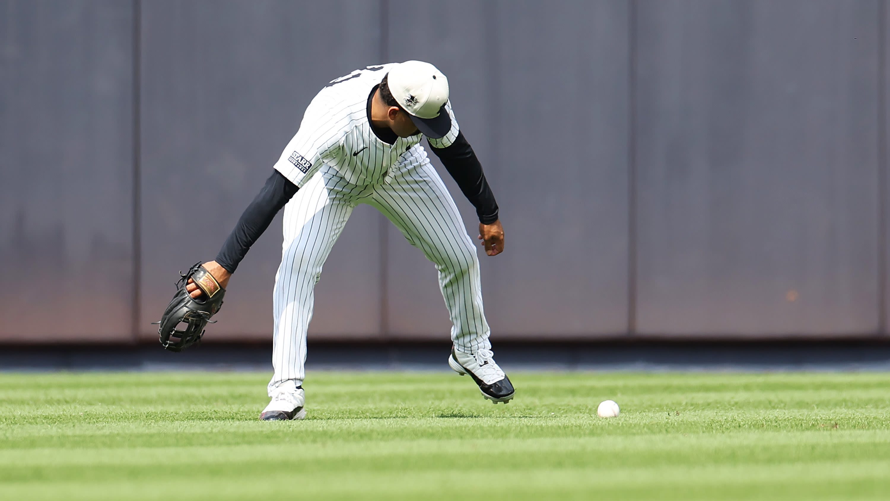 Aaron Boone Defends Trent Grisham for Lack of Hustle on Error in Loss