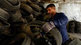 Gaza man turns waste car tyres into materials for sports pitches