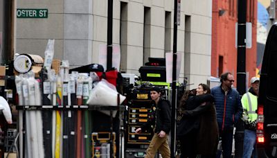 Zombies take to the roof, fans wait below as 'Walking Dead" filming begins downtown