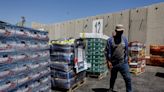 Israel cites aid backlog in Gaza; UN says: 'We're doing what we can'