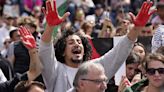 German chancellor Olaf Scholz heckled by pro-Palestinian protesters at SPD rally