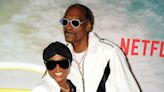 Snoop Dogg and His Wife Shante Broadus Put a Spin on Classic Suiting at ‘Day Shift’ Premiere