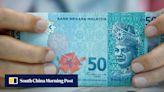 Malaysia’s Anwar says economy, investments booming despite ringgit slump