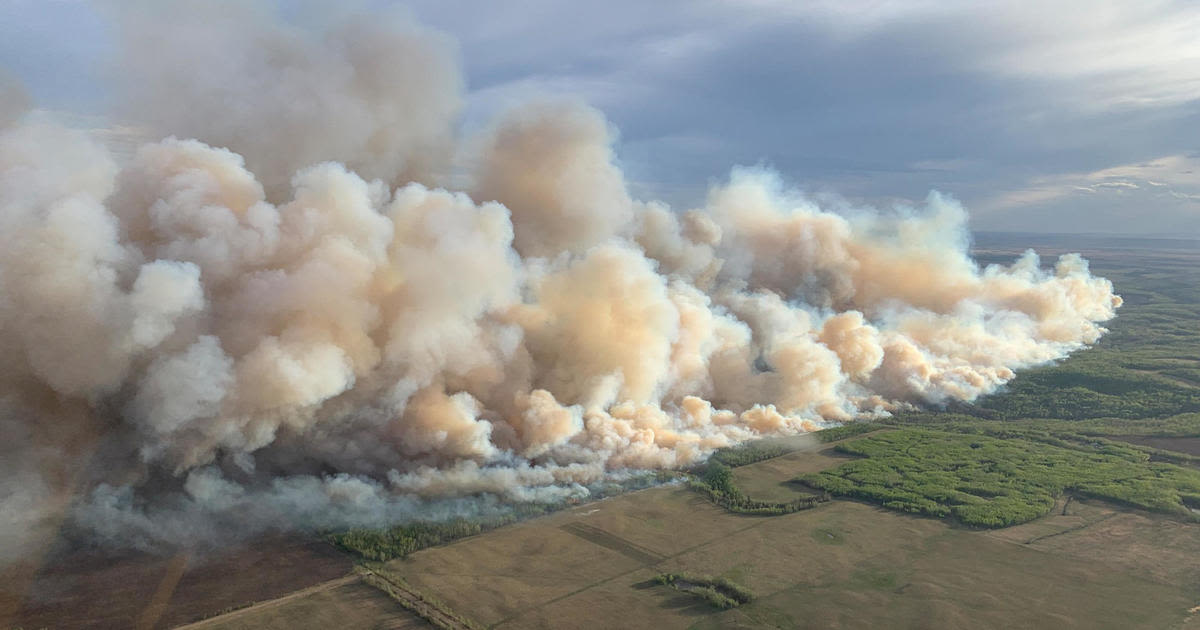 Wildfire in Canada forces thousands to evacuate as smoke causes dangerous air quality