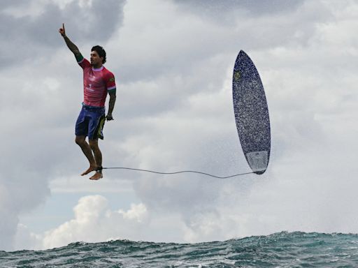 2024 Olympics: Brazilian surfer Gabriel Medina appears to defy gravity in spectacular photo of record-setting ride