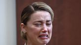 An inconsolable Amber Heard sobbed on the stand as she recalled Johnny Depp penetrating her with an alcohol bottle during major fight