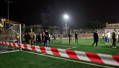 Israel says Hezbollah rocket kills 12 at football ground, vows response