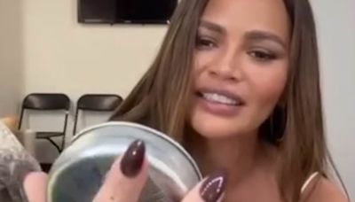 Chrissy Teigen unboxes a 17-year-old tin of Altoid Sours