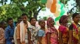 Voters queue to vote in India's Dugeli village, site of a decades-old Maoist insurgency