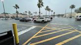 Flash flooding swamps Sarasota, submerging roads and cars