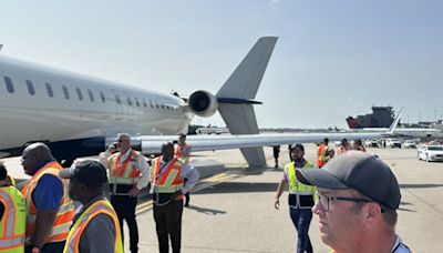 Delta plane tears tail off another jet after collision on Atlanta airport tarmac