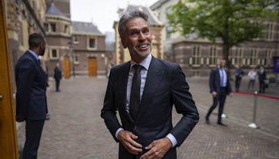 New Dutch leader pledges to cut immigration as the opposition vows to root out racists in cabinet