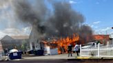 Colorado firefighters rescue 2 people from burning home in Commerce City