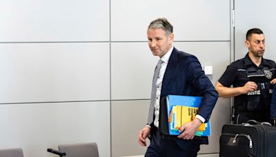 A well-known figure in a German far-right party tells his trial he is completely innocent