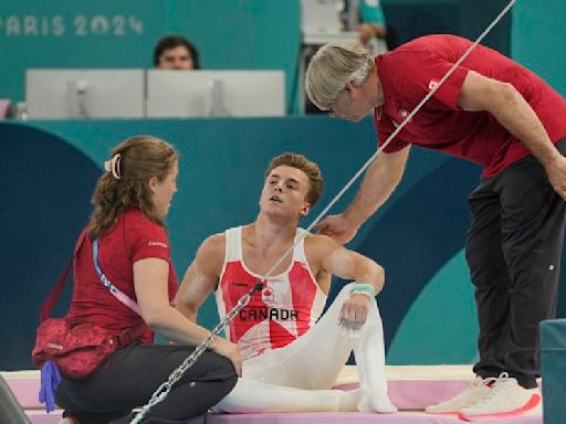 Olympics-Gymnastics-Canada's Dolci gets second chance on bar after equipment malfunction