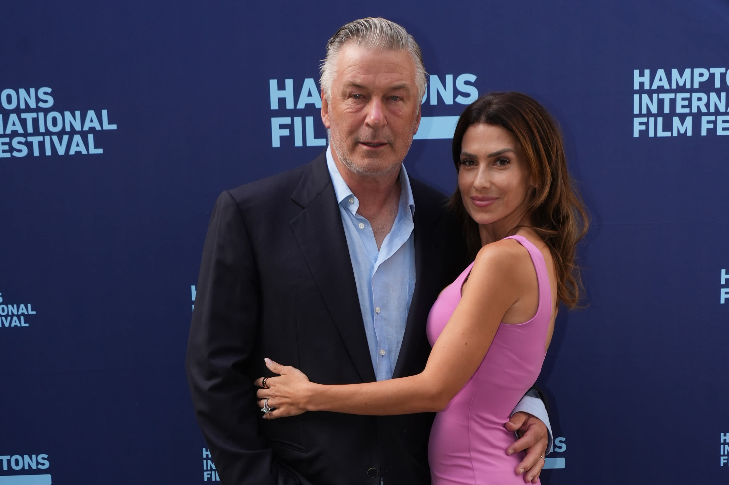 Alec Baldwin and wife Hilaria smile at first event after trial dismissal