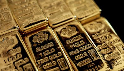 Gold jumps to record above $2,460 an ounce on hopes Fed will soon cut rates