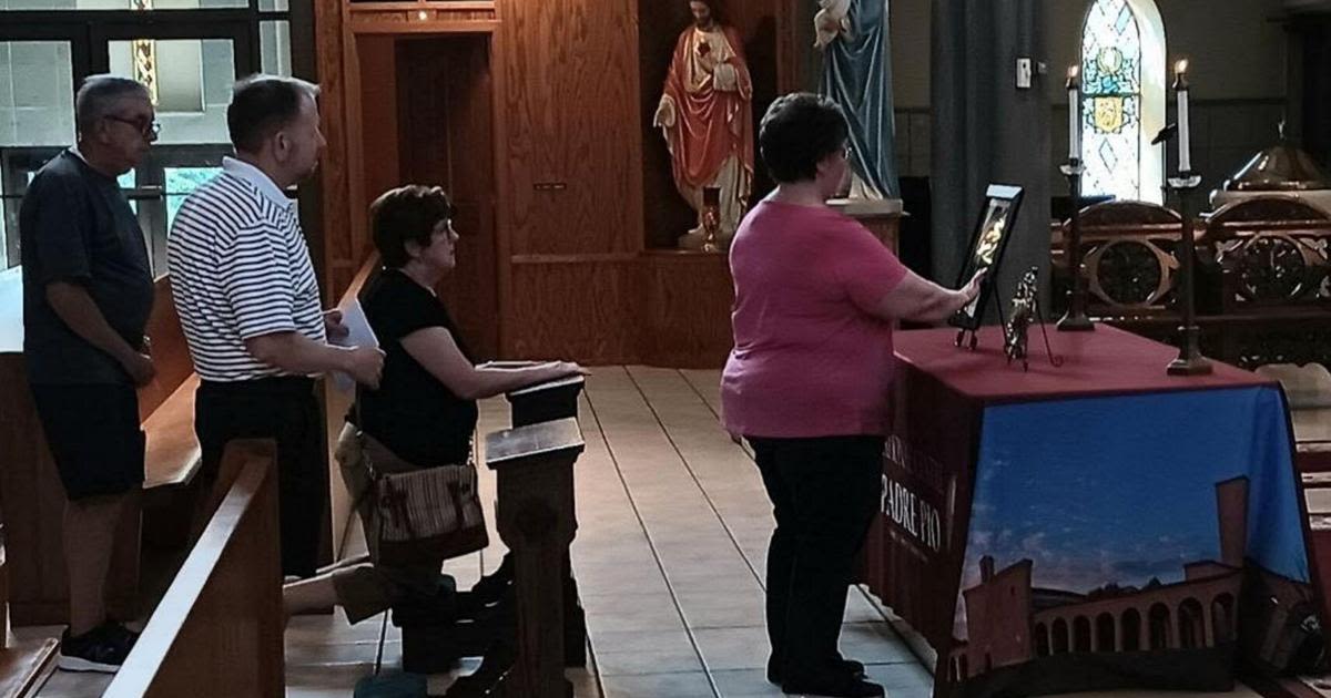 Faithful ask for intercession of Saint Padre Pio at viewing of relics in St. Patrick church
