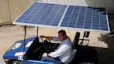 In Venezuelan oil town, solar-powered car offers escape from fuel lines