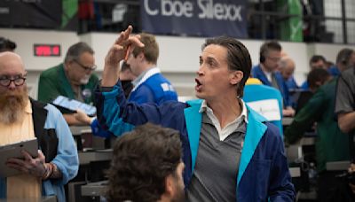 Stock market news today: Dow slips in wake of global outage