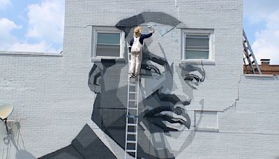 Mural of Martin Luther King Jr. being painted on side of Youngstown building