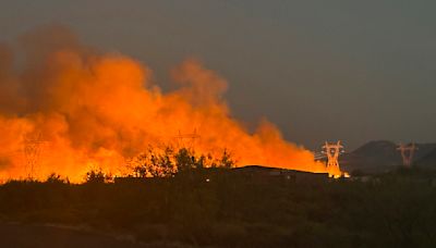 Air tankers and helicopters attack Arizona wildfire that has forced evacuations near Phoenix